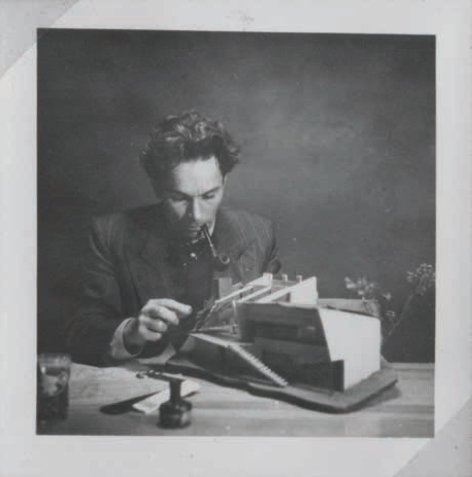 Hugh Buhrich, 1953, with architectural model. Courtesy of Neil Buhrich.